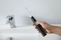 Philips Sonicare ProtectiveClean 4100 Plaque Control Rechargeable Electric Toothbrush, Black, HX6810/50