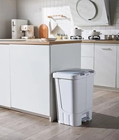 The Step N' Sort 40L Dual Trash and Recycling Bin with Spring Top opening and Hands-free slow close lid. White