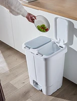 The Step N' Sort 40L Dual Trash and Recycling Bin with Spring Top opening and Hands-free slow close lid. White