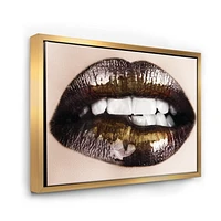 Designart Black Gold Lips Biting FLOAT FRAME WALL ART