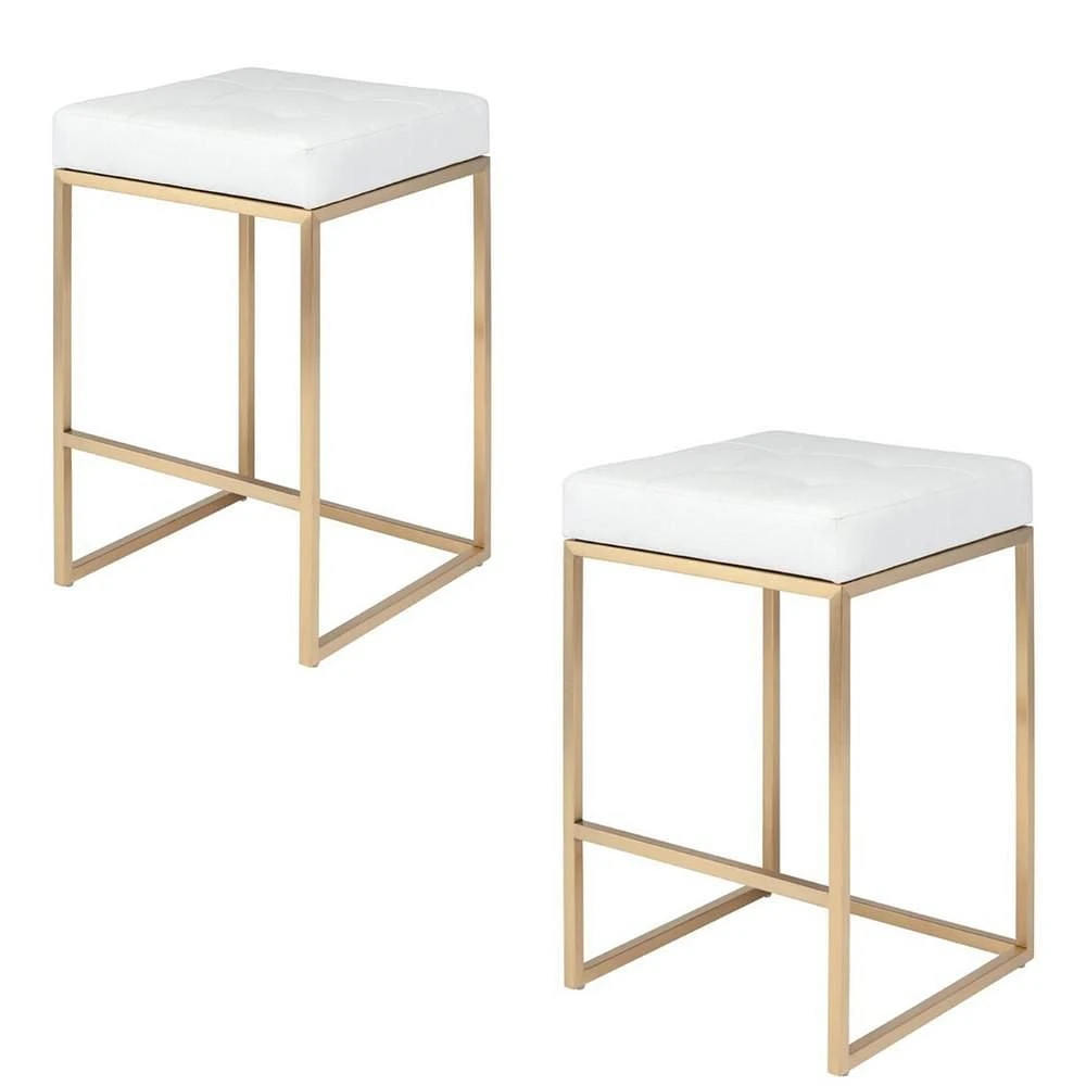 PIPE II COUNTER STOOL with tufted cushion and brushed gold stainless steel frame.