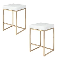 PIPE II COUNTER STOOL with tufted cushion and brushed gold stainless steel frame.