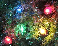 Holiday Time Multi-Color Incandescent C9 Holiday String Lights, 21’, Green Wire (25 Count), 10" (25.4 cm) bulb spacing