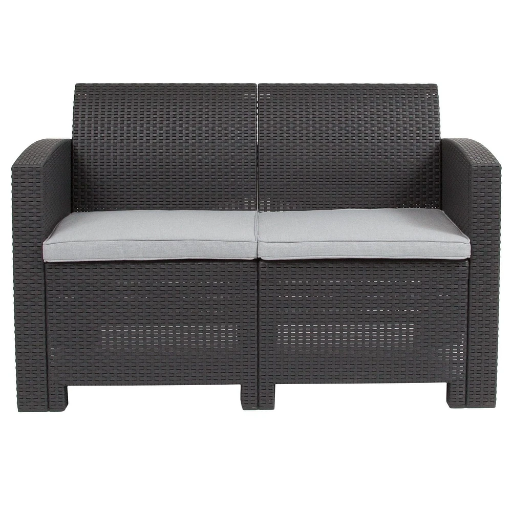 Causeuse en fausse rotin gris clair avec coussin gris clair tout temps