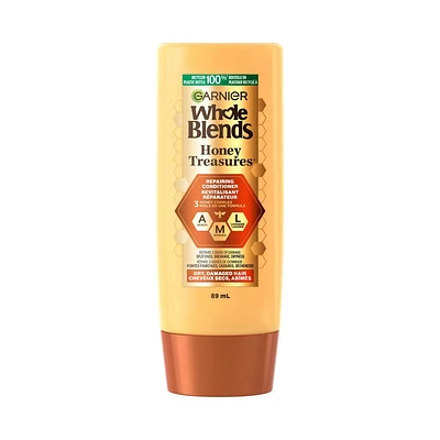 Garnier Whole Blends Honey Treasures Revitalisant Réparateur pour Cheveux Secs et Abîmés, 89ml Répare les cheveux abîmés