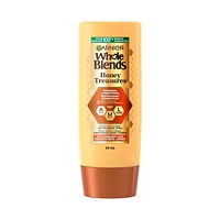 Garnier Whole Blends Honey Treasures Revitalisant Réparateur pour Cheveux Secs et Abîmés, 89ml Répare les cheveux abîmés