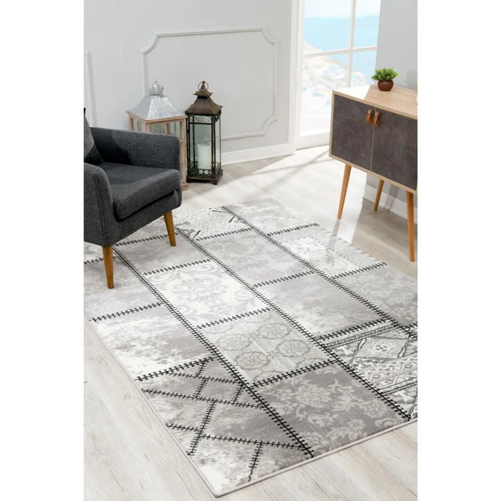 Tapis d'intérieur abstrait moderne avec montage de branches de tapis