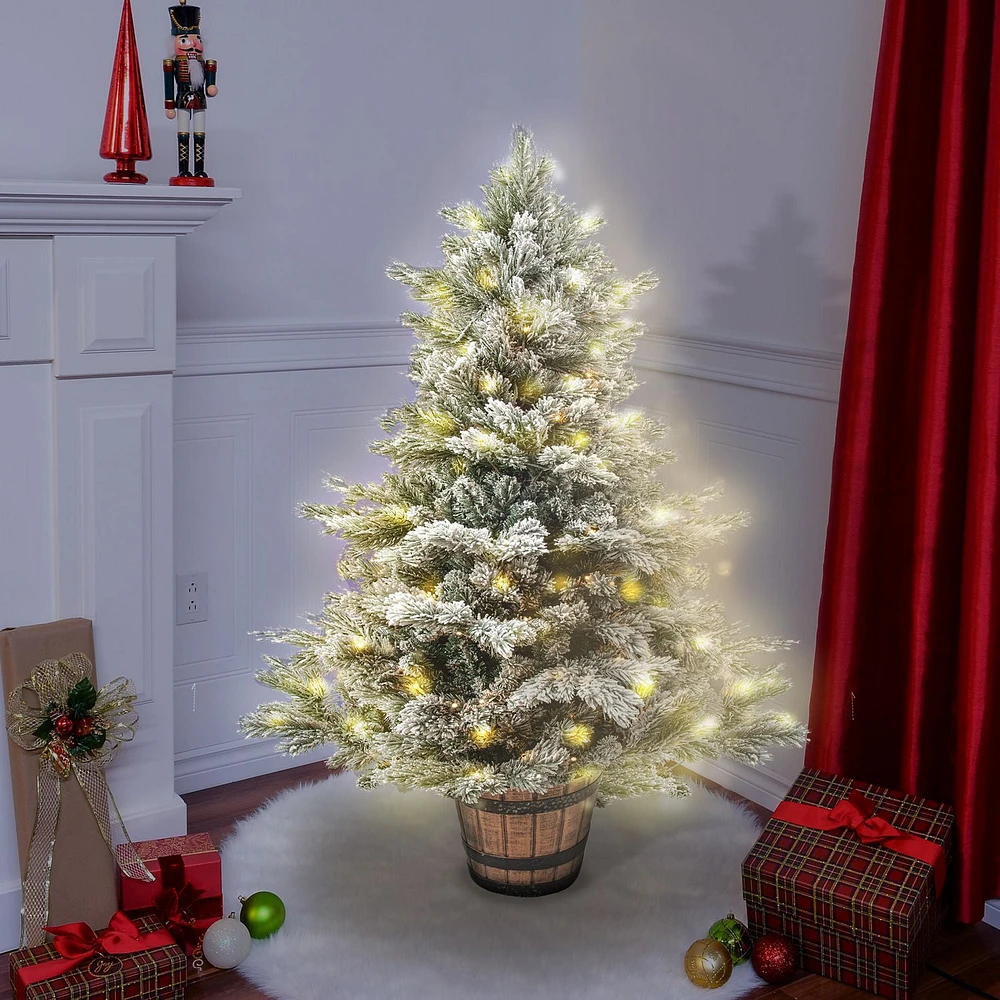 4.5 FT prelit flocked potted pine tree,100 5mm dual led (warm white/multi),8 functions,329 tips