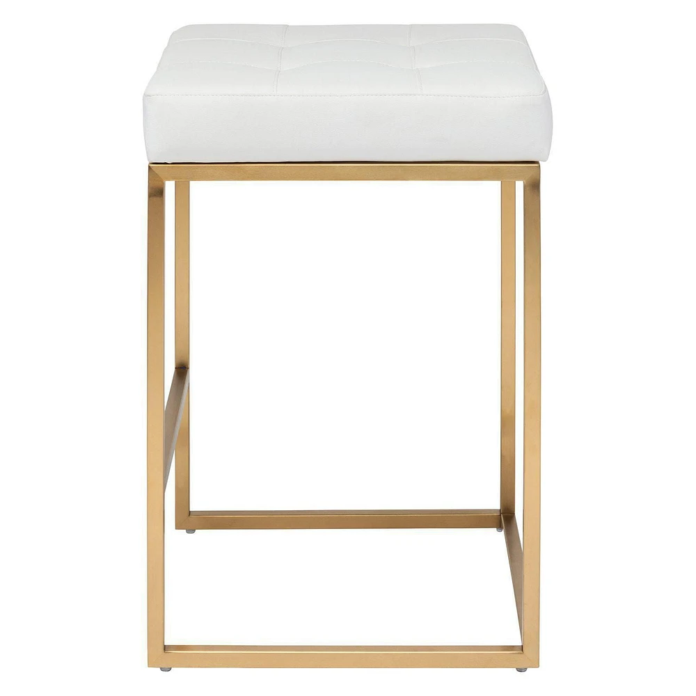 PIPE II COUNTER STOOL with tufted cushion and brushed gold stainless steel frame.