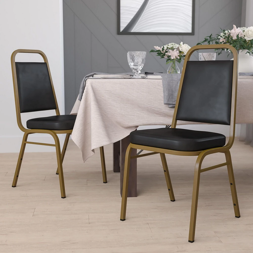 4 Pk. HERCULES Series Trapezoidal Back Stacking Banquet Chair in Black Vinyl - Gold Frame