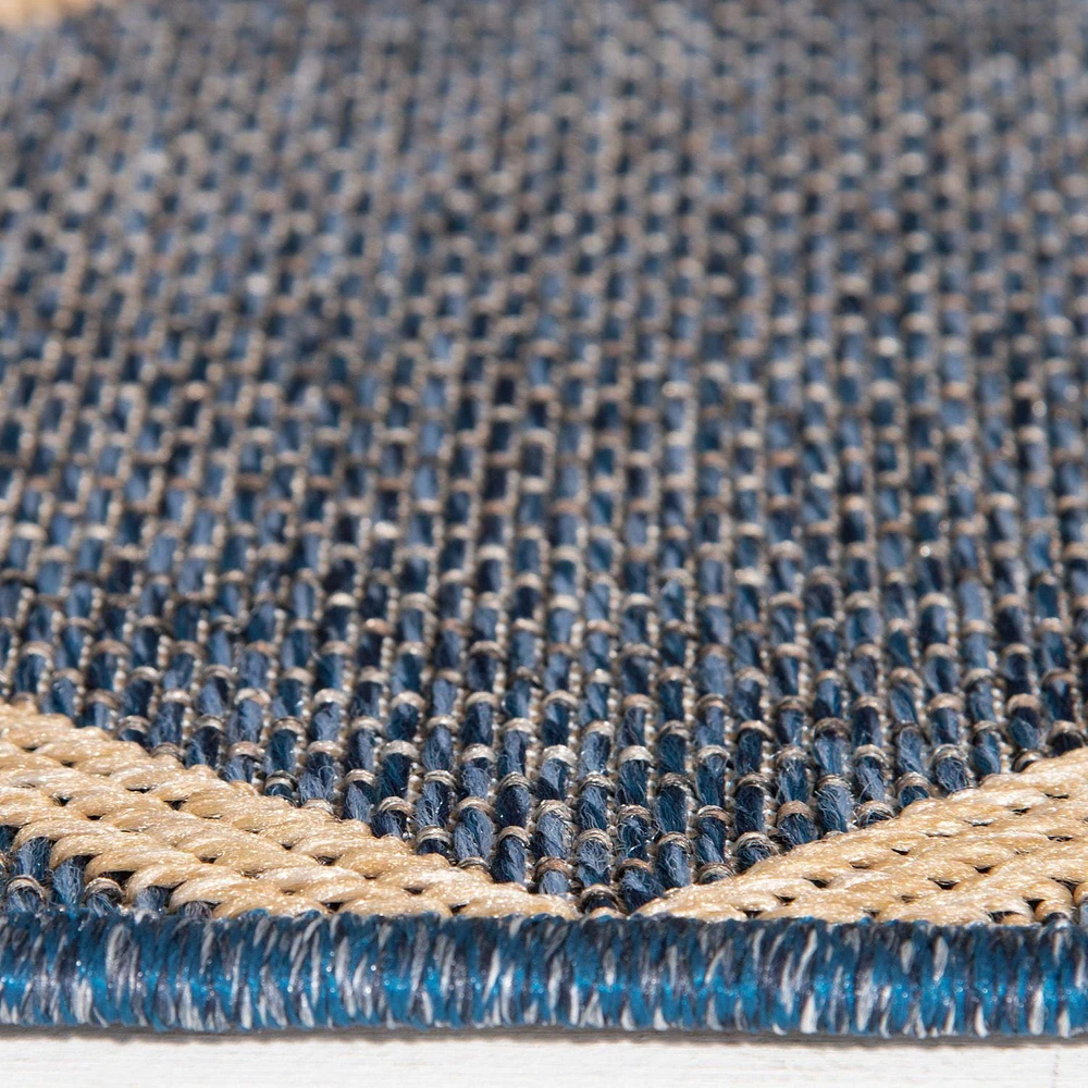 Smithleighs Cobalt Blue and Tan Woven Area Rug