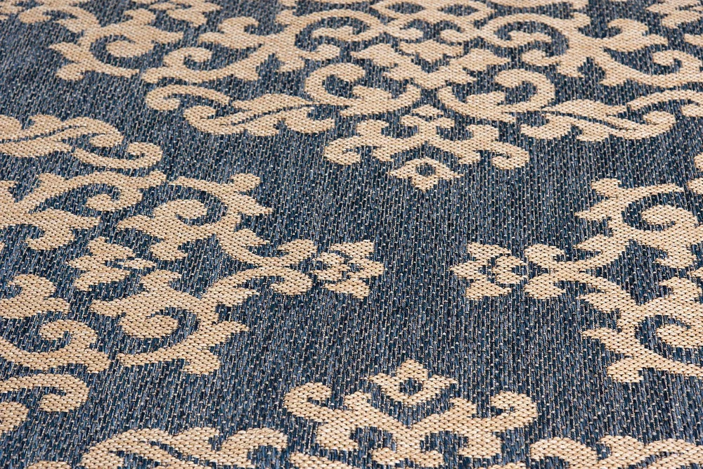 Smithleighs Cobalt Blue and Cream Woven Area Rug