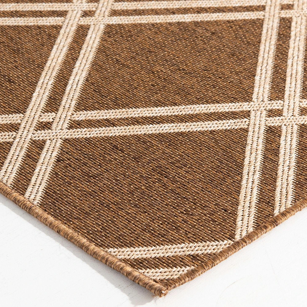 Smithleighs Beige and Tan Woven Area Rug