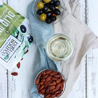 Natursource Olio d'Oliva Premium Almonds 150g, ·Premium almonds from California tossed with olive oil & sea salt<br>·Artisanally dry roasted (never fried)<br>·Clean label – only 3 ingredients!<br>·6g of plant-based protein per 28g serving<br>·3g of fibre per 28g serving<br>·KETO certified by the Paleo Foundation<br>·GMO Free