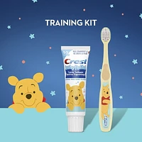 Crest Training Toothpaste Kit, Fluoride Free, Mild Strawberry Gel Toothpaste 36 mL + 1 Toothbrush, featuring Disney Winnie the Pooh, 1 Kit