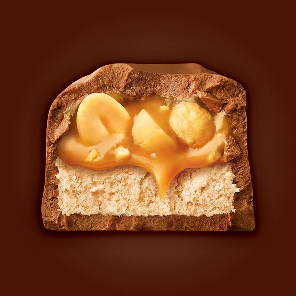 SNICKERS, barre choc. au lait et arachides, grand format 2 morc., 93 g Contient une (1) barre SNICKERS grand format de 93 g.