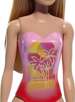 Beach Barbie Doll with Blond Hair Wearing Pink Palm Tree-Print Swimsuit, Ages 3+