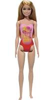 Beach Barbie Doll with Blond Hair Wearing Pink Palm Tree-Print Swimsuit, Ages 3+