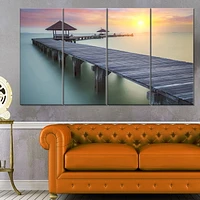 Tableau sur toile imprimée Design Art Photographie bord de mer Pont en bois de la mer et coucher de soleil