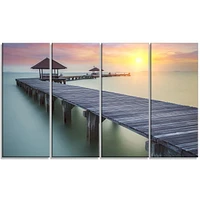 Tableau sur toile imprimée Design Art Photographie bord de mer Pont en bois de la mer et coucher de soleil