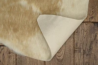 Mini tapis d'appoint en fausse peau de vache mélangé crème caramel