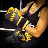 Gants de boxe serie thaï d'IBF - 12 once. - Noir et dorées