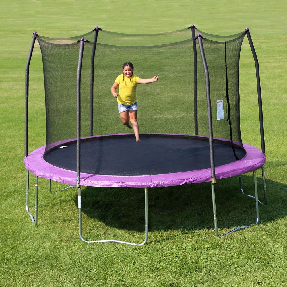 SKYWALKER TRAMPOLINES Trampoline d'extérieur rond de 14 pieds violet pour enfants avec filet de sécurité et coussin à ressorts, approbation ASTM, résistant à la rouille et piquets anti-vent robustes,