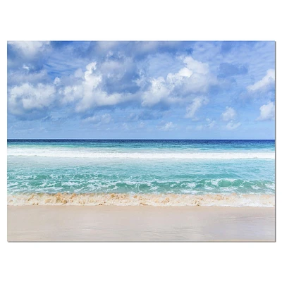 Designart Tranquil Beach under White Clouds Canvas Wall Art