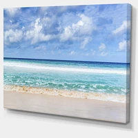 Designart Tranquil Beach under White Clouds Canvas Wall Art