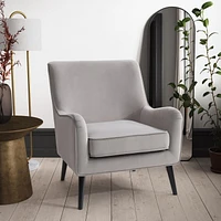 Chaise d'appoint moderne en velours Isla avec pieds en bois effilés