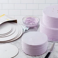 Plaques à gâteau rondes blanches de tailles variées Wilton