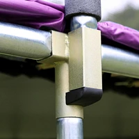 SKYWALKER TRAMPOLINES Trampoline d'extérieur rond de 14 pieds violet pour enfants avec filet de sécurité et coussin à ressorts, approbation ASTM, résistant à la rouille et piquets anti-vent robustes,