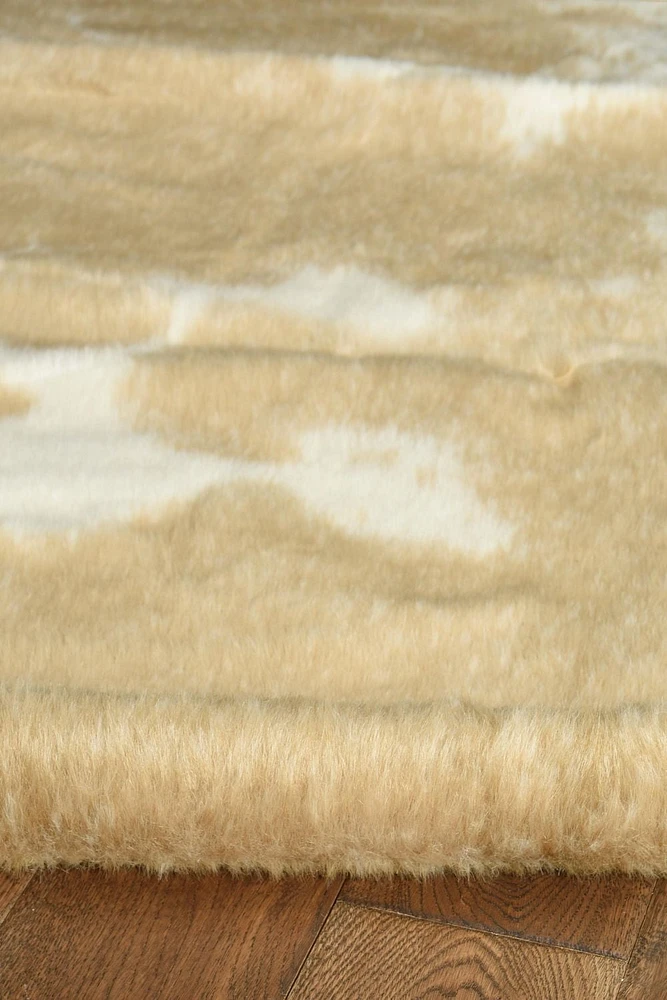 Mini tapis d'appoint en fausse peau de vache mélangé crème caramel