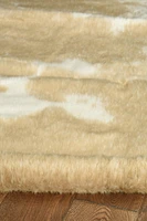Mini tapis d'appoint en fausse peau de vache mélangé crème caramel