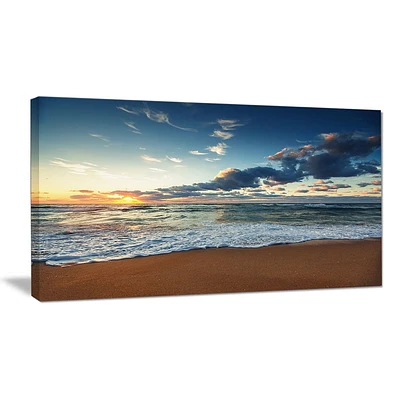 Tableau mural à toile Design Art Bord de mer Aube et vagues rayonnantes