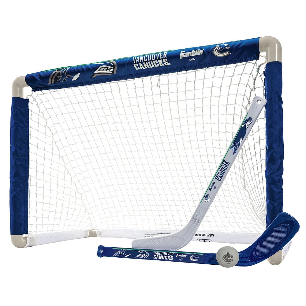 Franklin Sports Ensemble de mini hockey Capitals de la NHL – But de hockey intérieur pour enfants, ballon, 2 mini bâtons de hockey