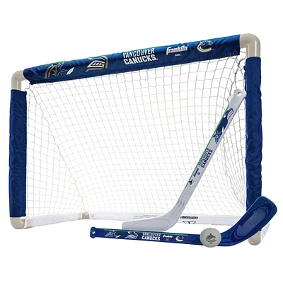 Franklin Sports Ensemble de mini hockey Capitals de la NHL – But de hockey intérieur pour enfants, ballon, 2 mini bâtons de hockey