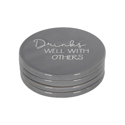 Ensemble de quatre dessous de verre en porcelaine Linden avec fini gris dictons divers 9,8 cm de diamètre