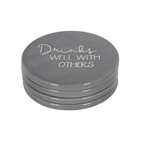 Ensemble de quatre dessous de verre en porcelaine Linden avec fini gris dictons divers 9,8 cm de diamètre