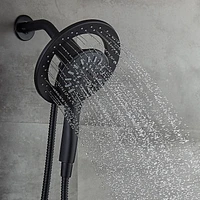 Valve thermostatique carrée avec déviateur à 4 voies d'Akuaplus®. 2 douchettes magnétiques à 3 réglages avec bouton poussoir et pommeau de douche pivotable. Fini noir mat