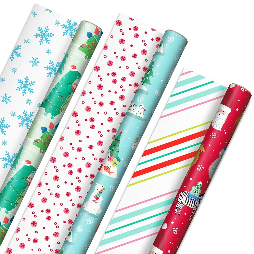 Papier d'emballage Hallmark réversible de Noël pour enfants, motif tendance (3 rouleaux : 120 pieds carrés au total) dinosaures, koalas, ours polaires, pingouins, chameaux, zèbres, rayures