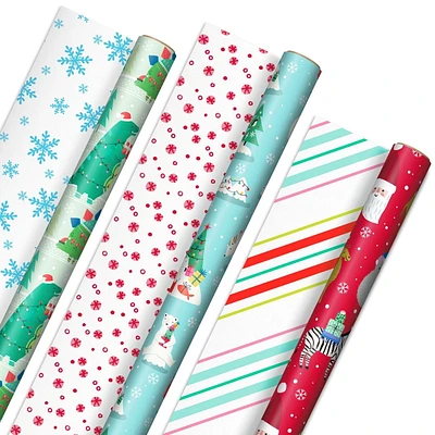 Papier d'emballage Hallmark réversible de Noël pour enfants, motif tendance (3 rouleaux : 120 pieds carrés au total) dinosaures, koalas, ours polaires, pingouins, chameaux, zèbres, rayures