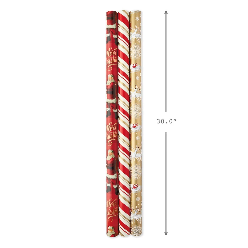 Papier d'emballage réversible de Noël, Hallmark, père Noël classique (Paquet de 3 rouleaux : 120 pieds carrés au total) flocons de neige rouges et or, rayures, motif écossais, traîneau du père Noël