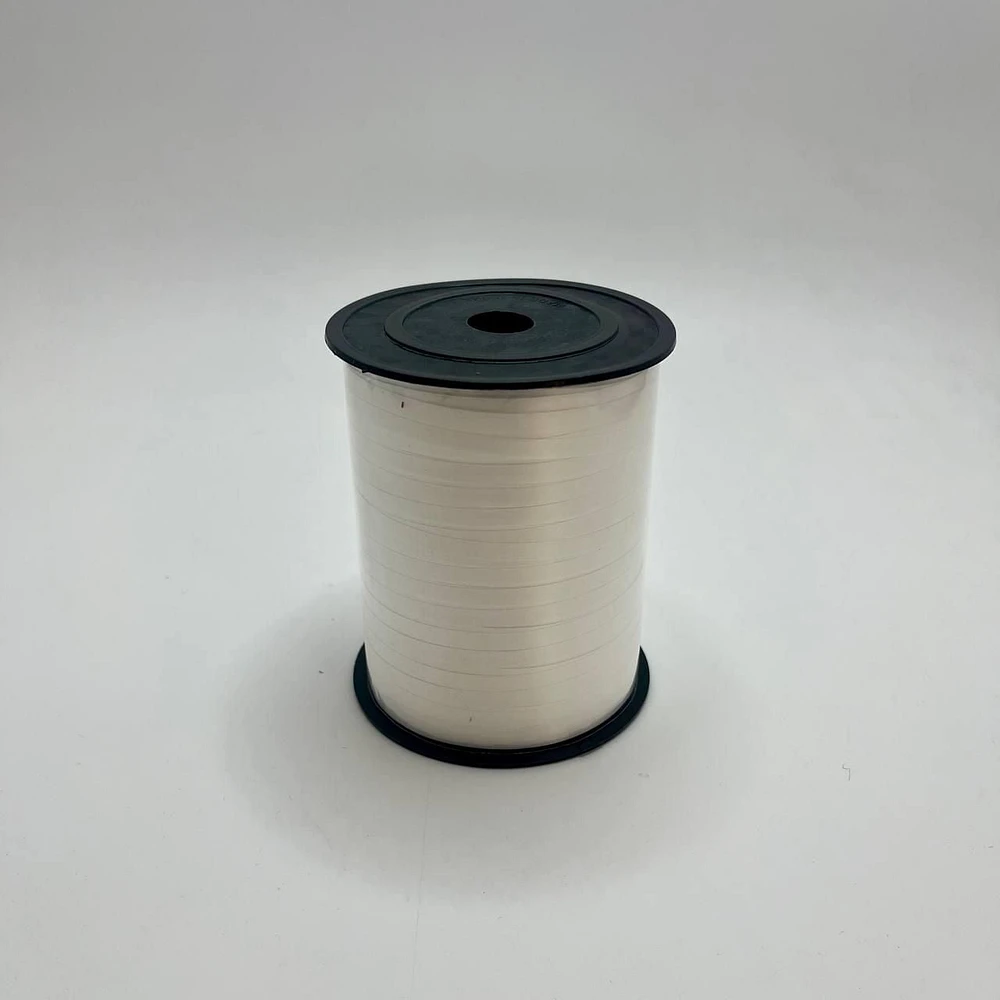 Rouleau de ruban à friser