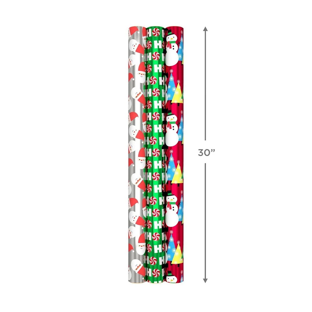 Papier d'emballage réversible – Hallmark (Pères Noël, joyeux messages, bonbons, pois, bonshommes de neige, rayures)