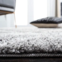 SAFAVIEH Berber Avery Geometric Diamonds Shag Area Rug