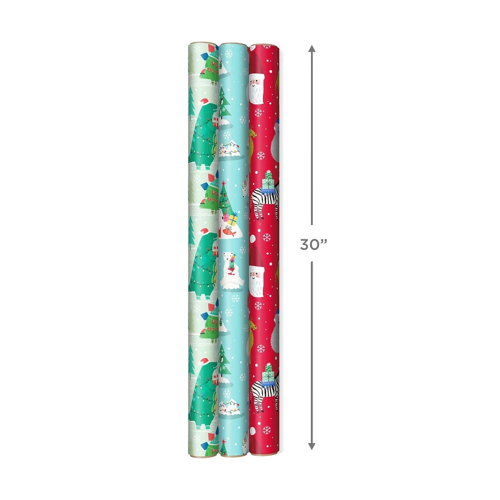 Papier d'emballage Hallmark réversible de Noël pour enfants, motif tendance (3 rouleaux : 120 pieds carrés au total) dinosaures, koalas, ours polaires, pingouins, chameaux, zèbres, rayures