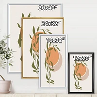 Designart Soleil et lune orange abstraits avec des feuilles tropicales ART MURAL À CADRE FLOTTÉ