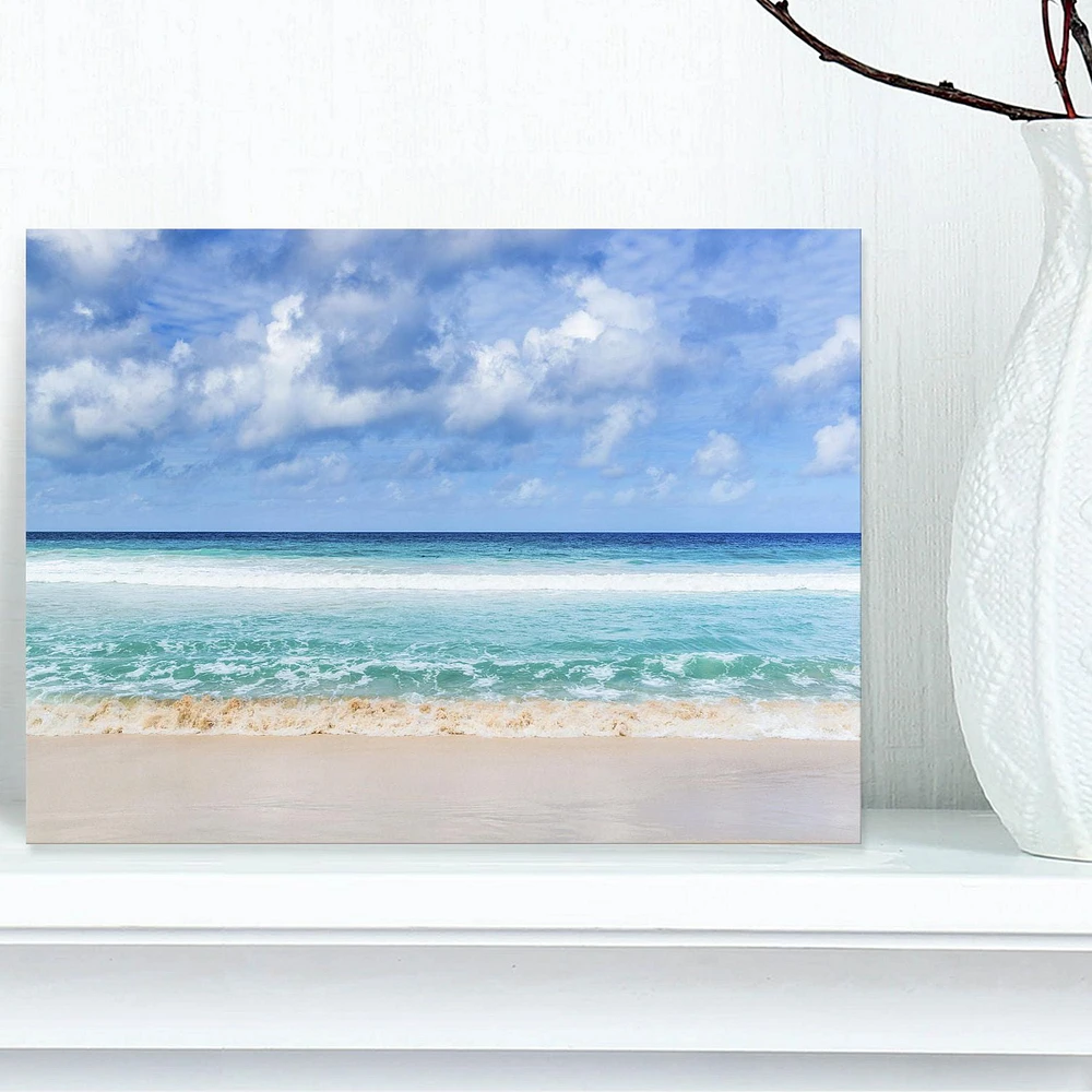 Designart Tranquil Beach under White Clouds Canvas Wall Art