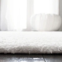 SAFAVIEH August Carlene Solid Plush Shag Area Rug